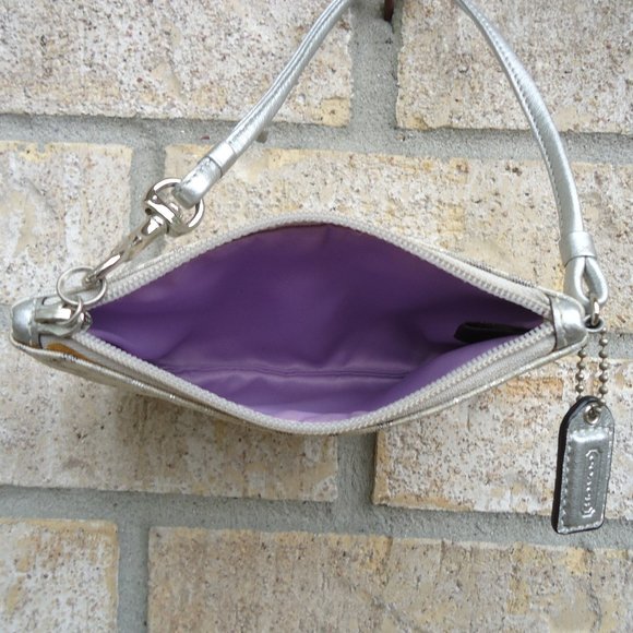 Coach wristlet with classic signature print canvas. - Picture 9 of 16